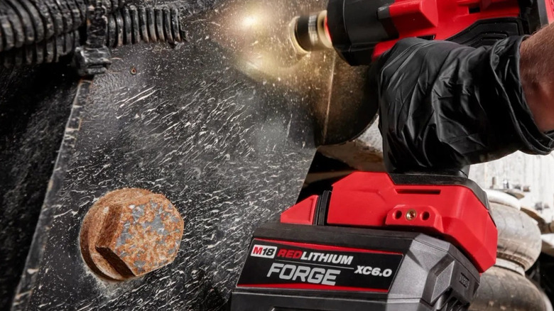 Milwaukee M18 Forge battery in use in a tool